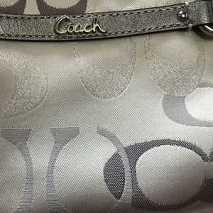 New with tag Coach silver and white wristlet
